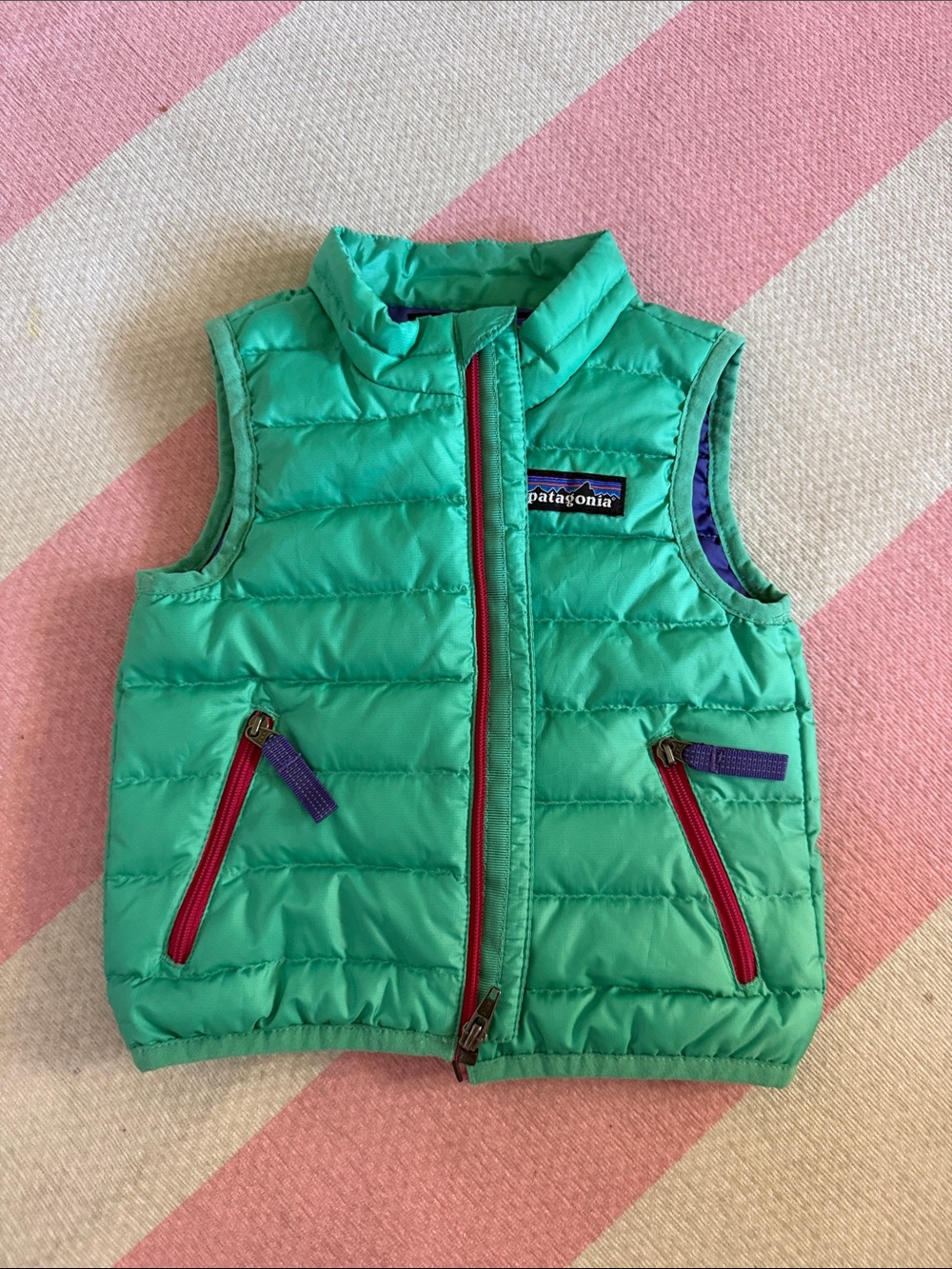 Patagonia Kids Teal Puffer Vest with Pink Zippers and Purple Trim